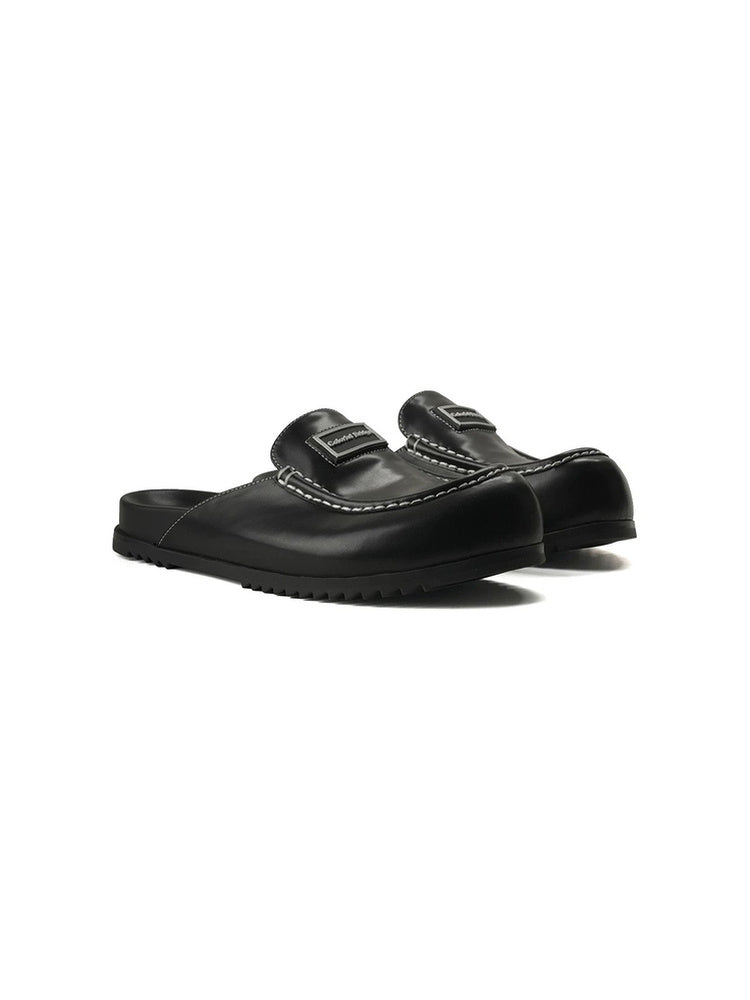 Noir Isle Buckled Leather Loafers