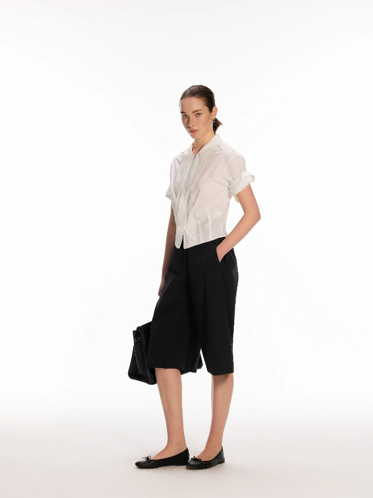 White Shirt with Embroidered Sash, Tuck Pleats, and Rolled Sleeves in a 50% Wool Blend with a Slightly Crinkled Texture
