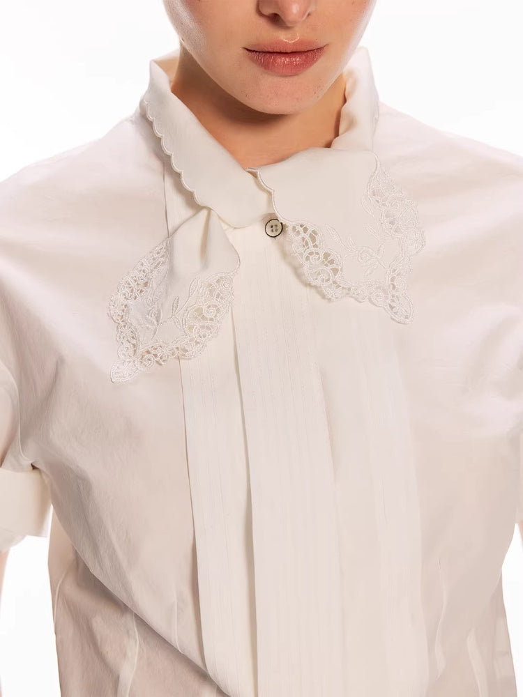 White Shirt with Embroidered Sash, Tuck Pleats, and Rolled Sleeves in a 50% Wool Blend with a Slightly Crinkled Texture