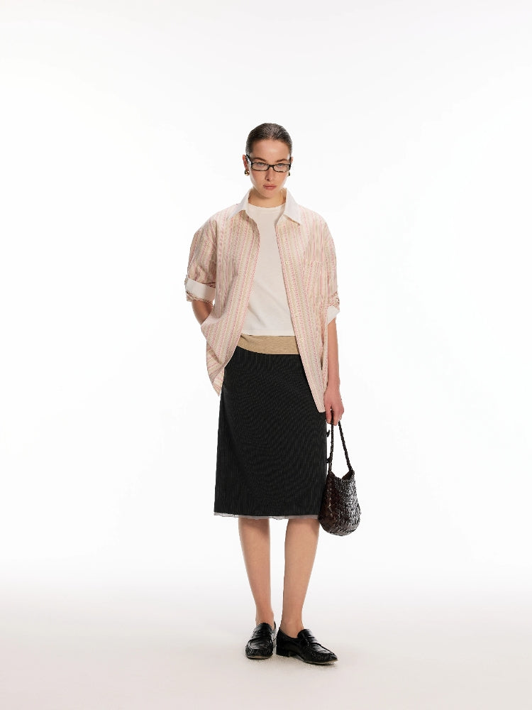 Dpercent: Floral-print tulle-trimmed hem with button detailing Classic, versatile striped skirt for the office
