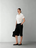 White Shirt with Embroidered Sash, Tuck Pleats, and Rolled Sleeves in a 50% Wool Blend with a Slightly Crinkled Texture